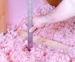 measuring amount of fiberglass insulation in attic